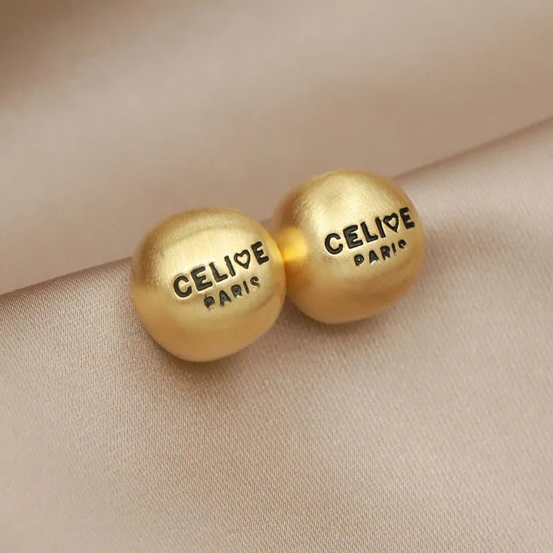 GOLD CELINE EARRING