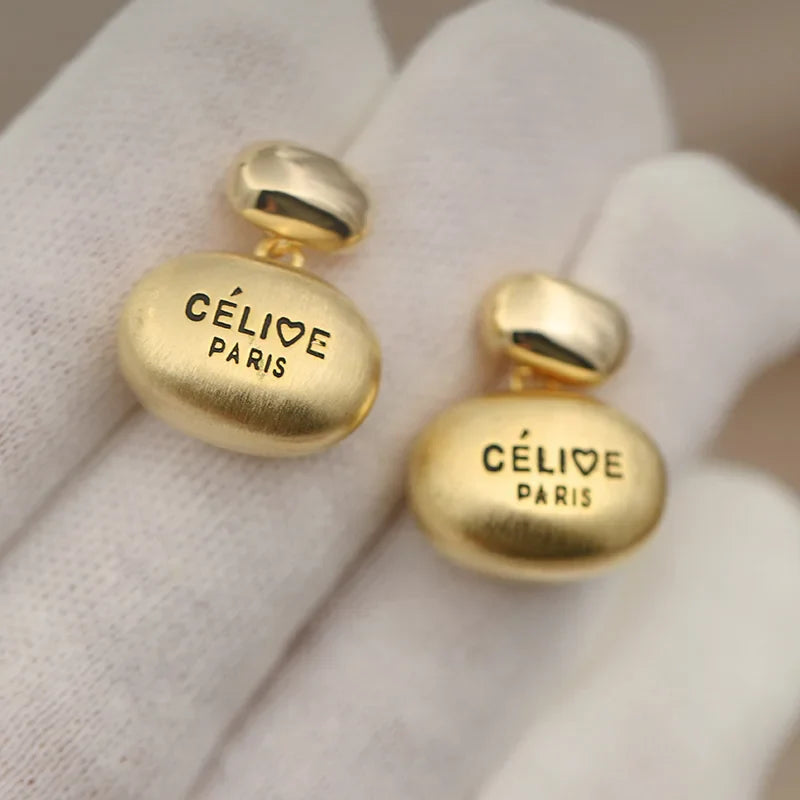 GOLD CELINE EARRING
